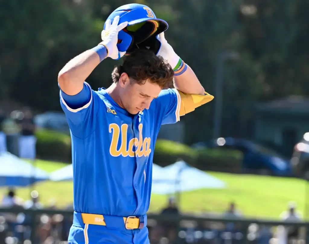 Roch Cholowsky #1 of the UCLA Bruins reacts after flying...