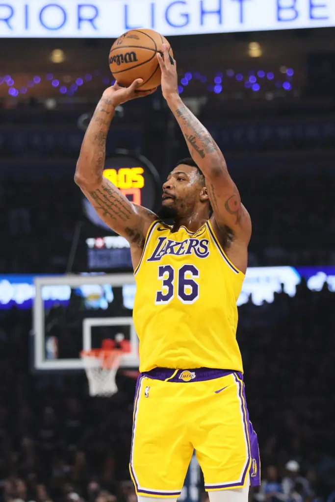 Los Angeles Lakers guard Marcus Smart shoots in the first...