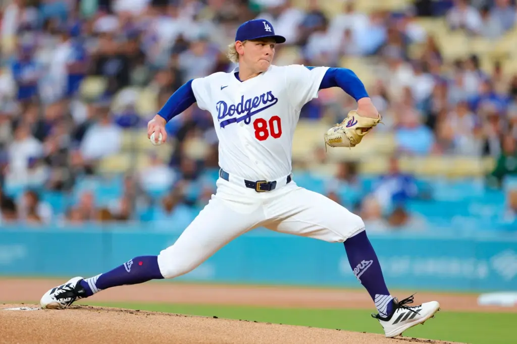 Dodgers starting pitcher Emmet Sheehan throws to the plate during...