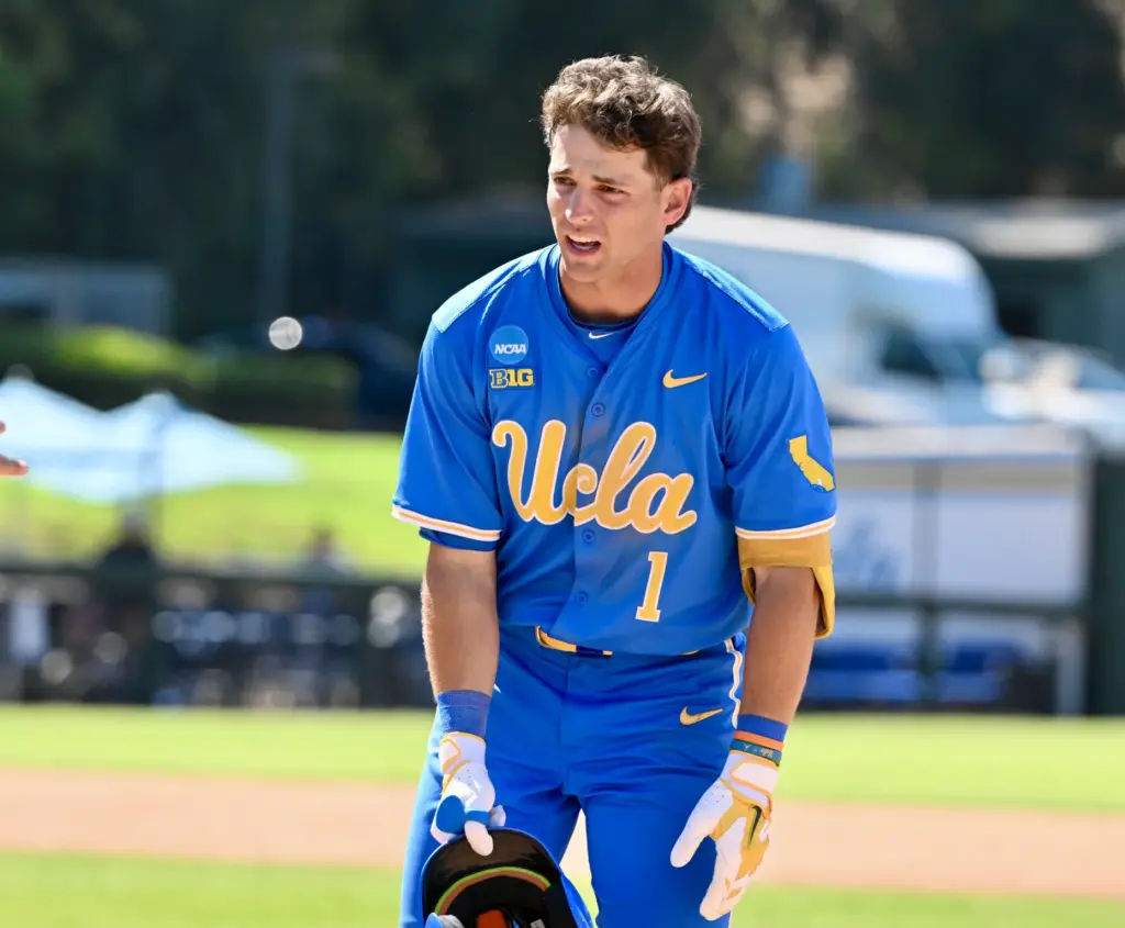 Roch Cholowsky #1 of the UCLA Bruins reacts after flying...