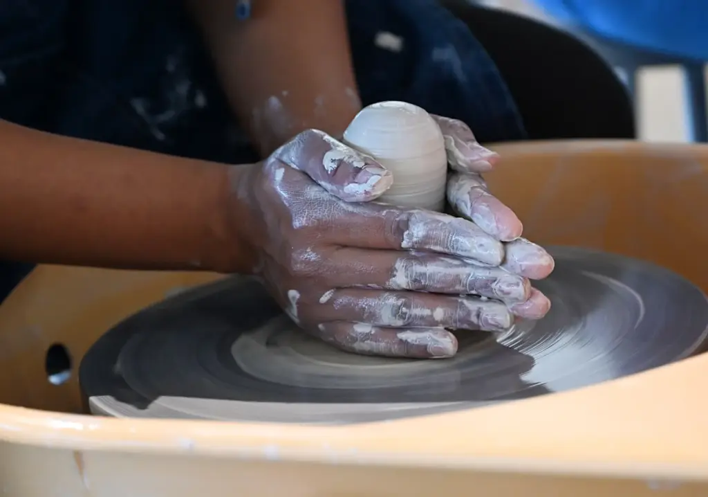 Elvira Maravilla of Fullerton works on Art Clay Play during...