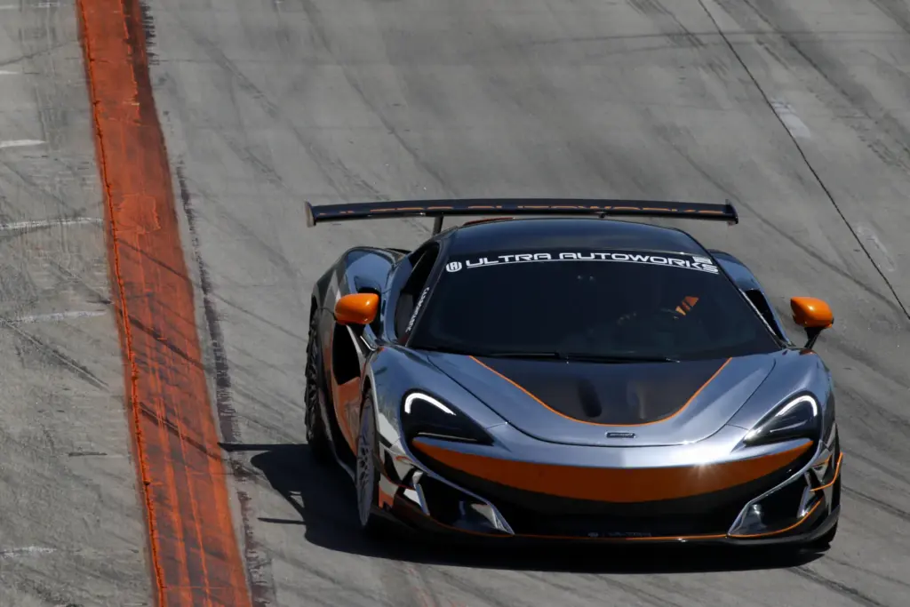 An exotic car rides the circuit in the Mornings CARnival...