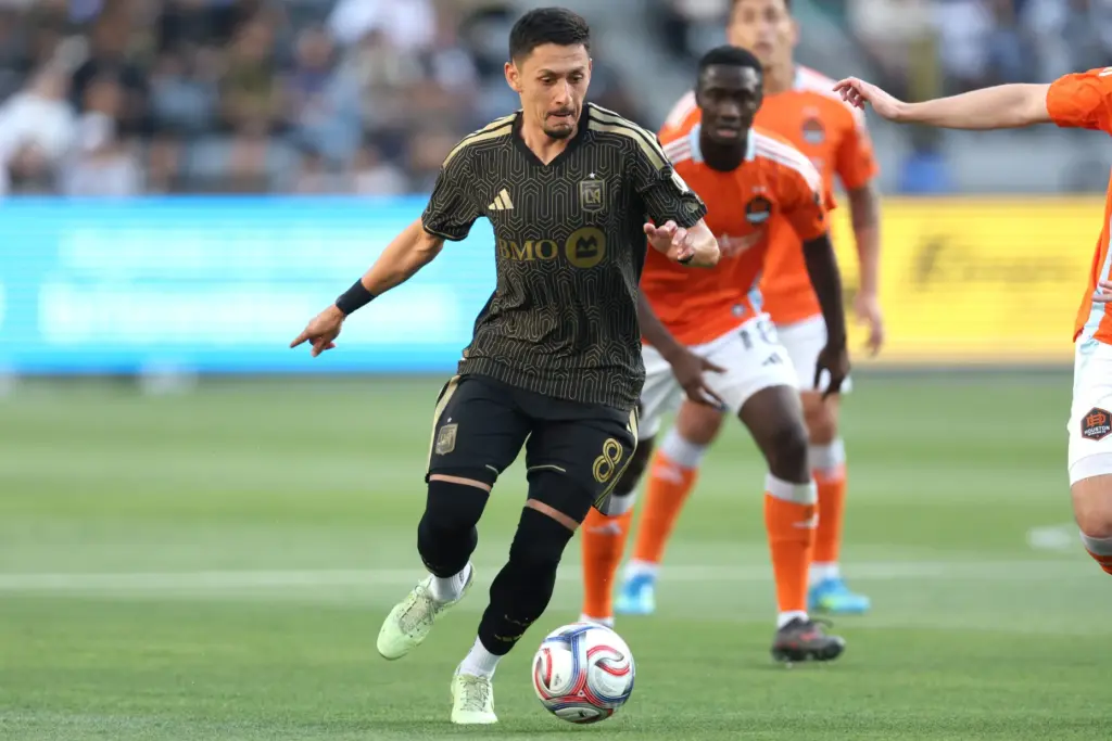 LAFC midfielder Mark Delgado controls the ball against the Houston...