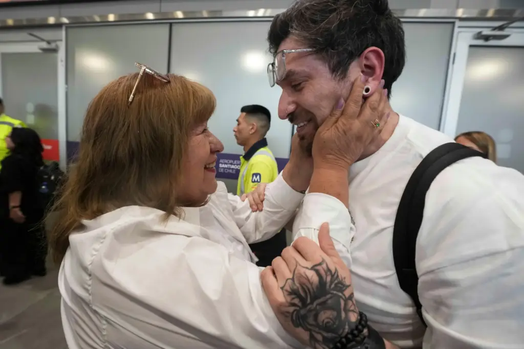 Kyle Adler embraces his birth mother Ana Maria Navarrete