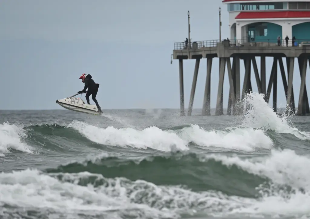 Dylan Waters (147) of Temecula, races past the Huntington Beach...