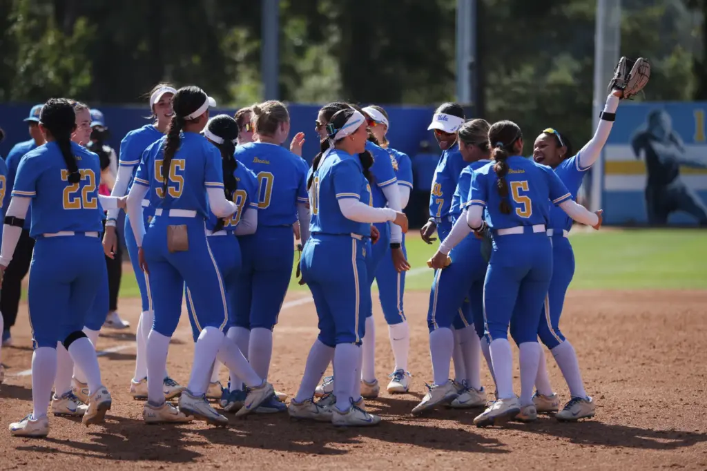 UCLA celebrates after defeating South Carolina 7-2 in the NCAA...