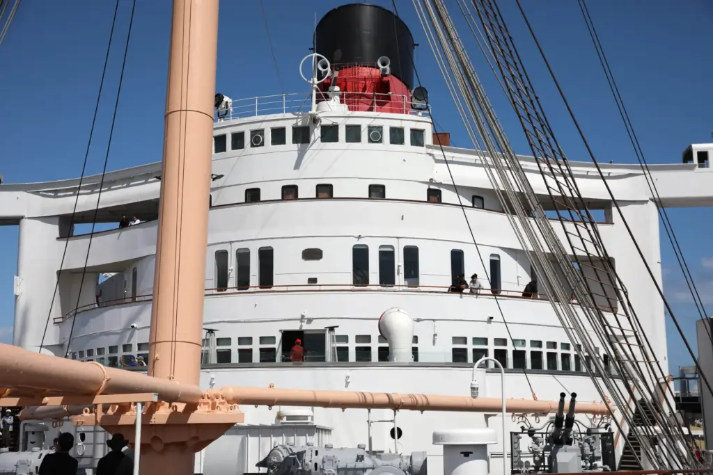 People visit the Queen Mary in Long Beach on Wednesday,...