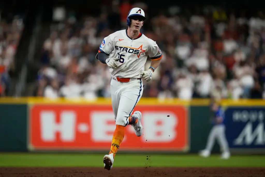 The Houston Astros’ Zach Cole runs the bases after hitting...