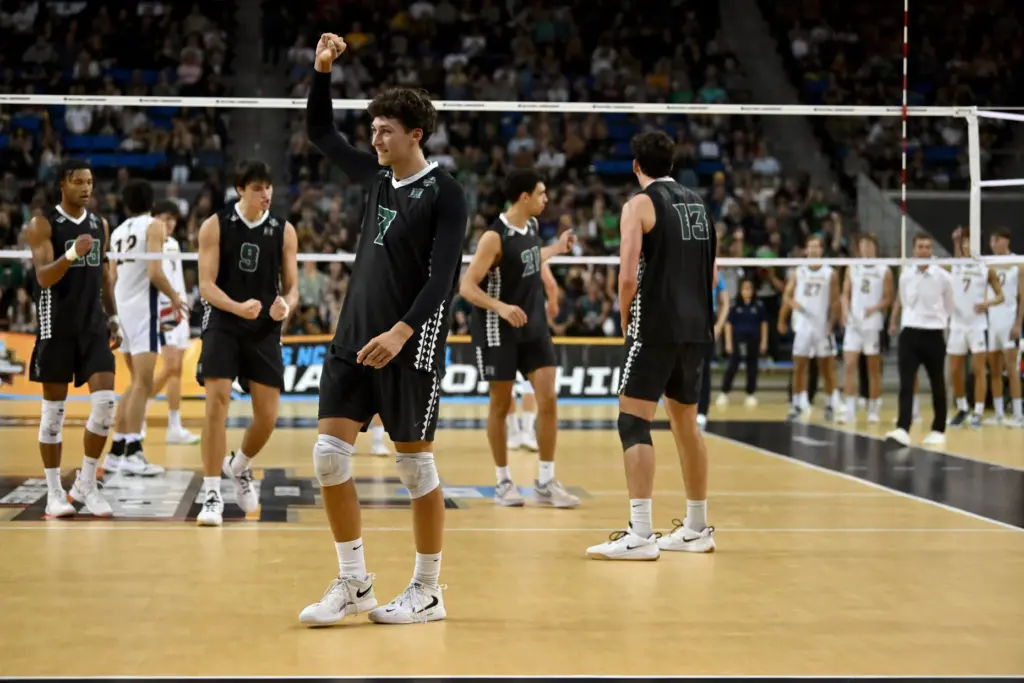 Hawaiiâs Adrien Roure (7) celebrates after they won a set...