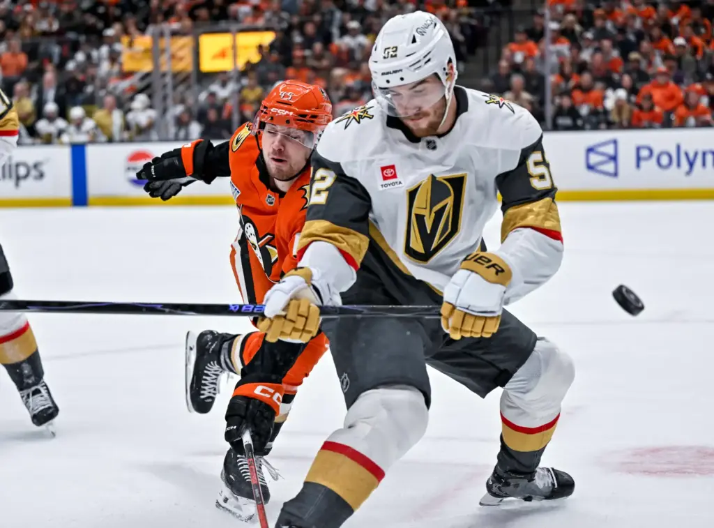 The Vegas Golden Knightsâ Dylan Coghlan, right, and the Ducksâ...