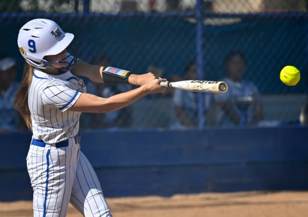 La Habra first baseman Evelyn Dickerson hits the ball during...