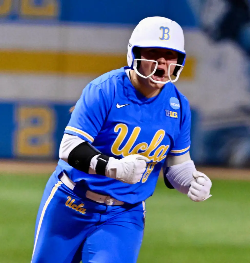 Alexis Ramirez #28 of the UCLA Bruins reacts after hitting...