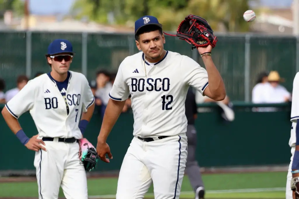 St. John Bosco starter Julian Garcia shows his disappointment after...