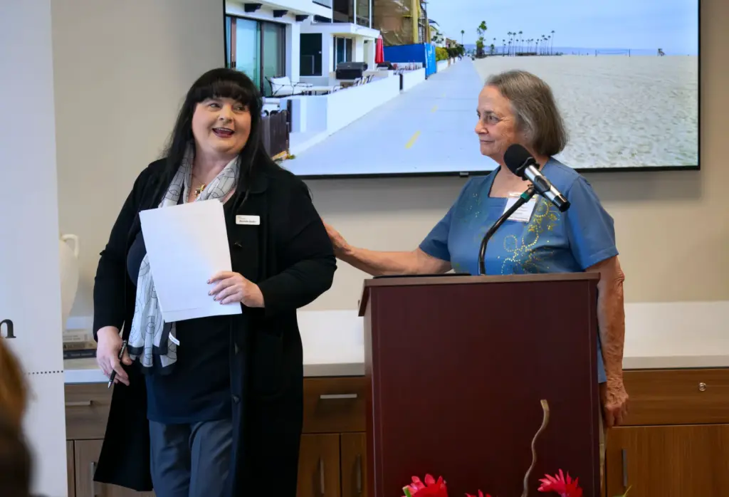 Recinda Shafer, left, of Riverside Charitable Corporation introduces Carolyn Pagani,...