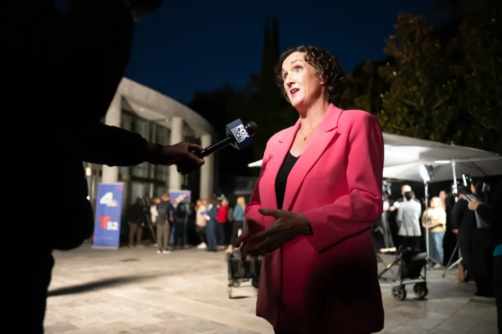 Gubernatorial candidate Katie Porter talks with media after a debate...