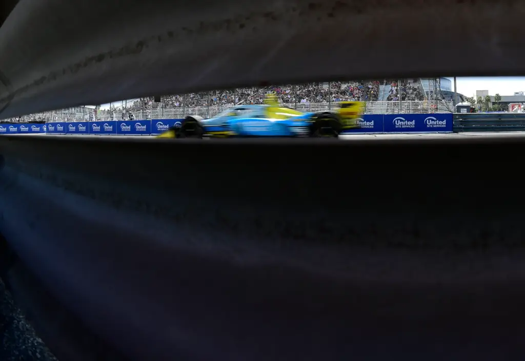 Indycar driver Christian Rasmussen races toward turn 10 during the...