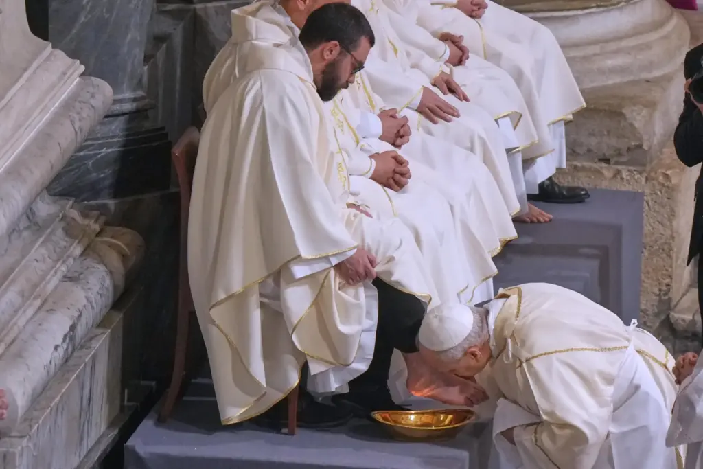 Pope Leo XIV washes and kisses the feet of 12 Roman priests.