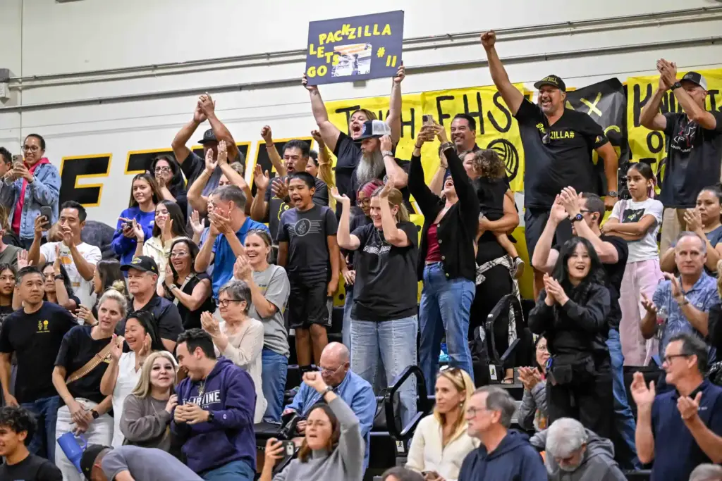 Foothill parents cheer wildly as the Knights defeat Servite 3...