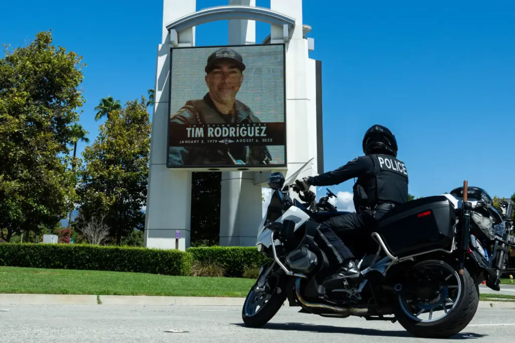 A photo of Fire Capt. Tim Rodriguez is displayed on...
