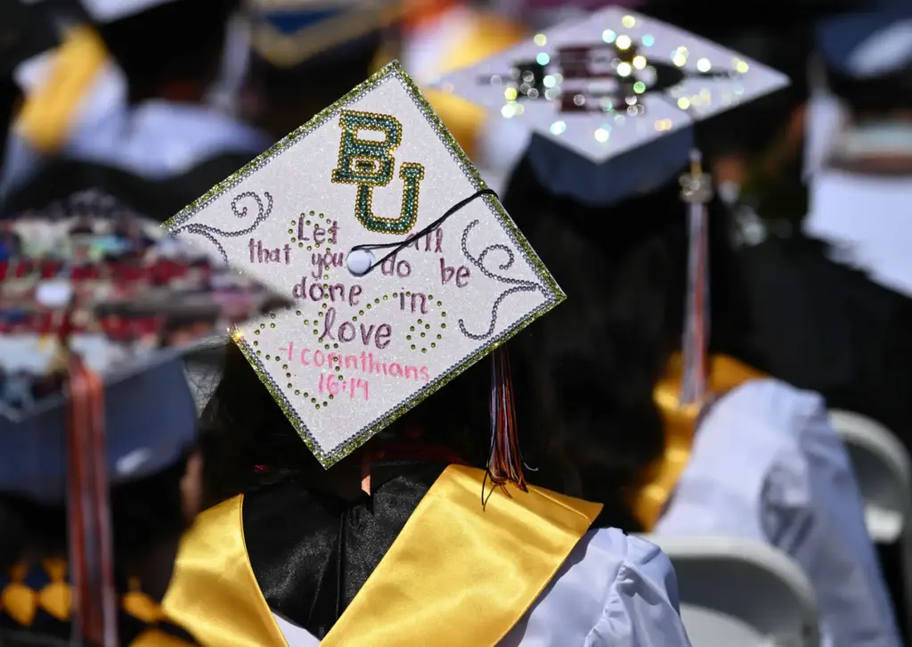 Huntington Beach High School graduates show their creativity by decorating...