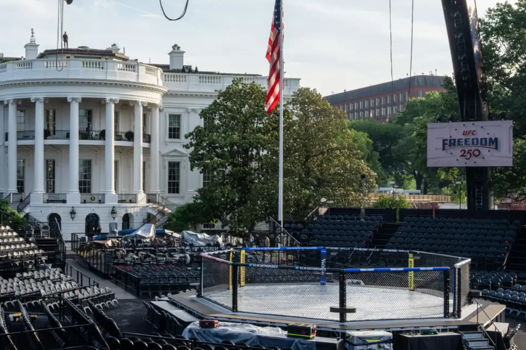 Members of the media view the arena for the UFC...