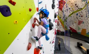 Kids are literally climbing the walls this summer at Sender One’s climbing camp
