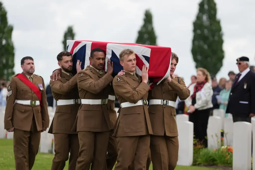 Soldiers from the Princess of Wales’s Royal Regiment carry a...