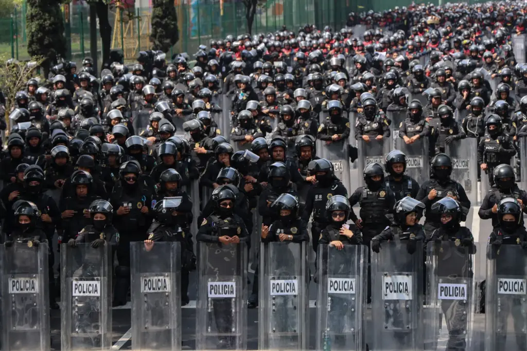 Police officers block a street to the stadium ahead of...