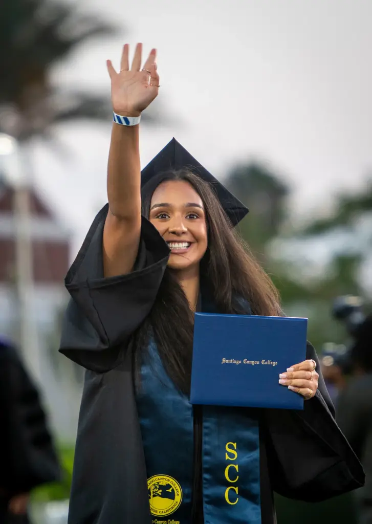 A graduate was all smiles after receiving her diploma and...