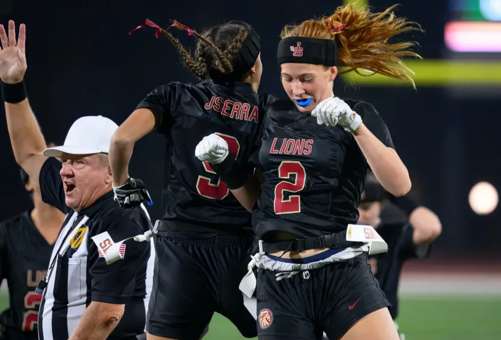 JSerra wide receiver Ava Irwin, right, celebrates with running back...