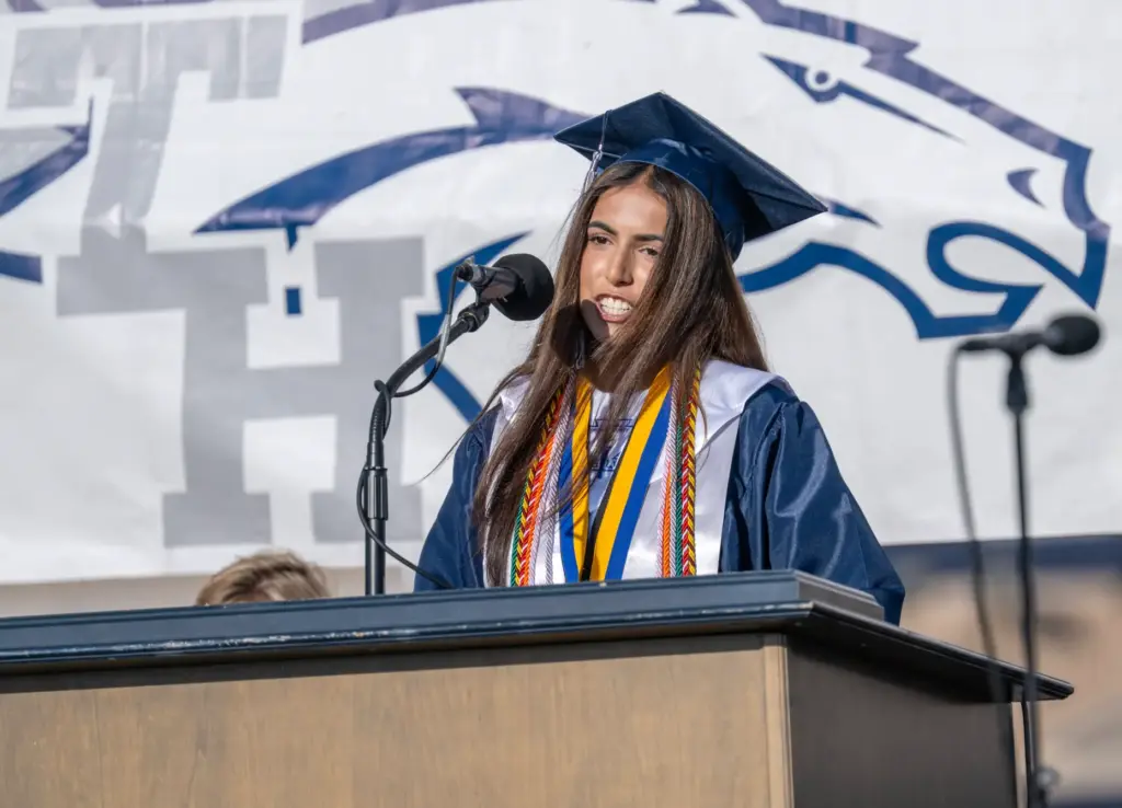 ASB President Sonal Gill welcomes graduates and their families to...