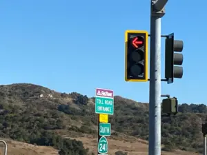 Why is there a yellow border on some traffic signals?