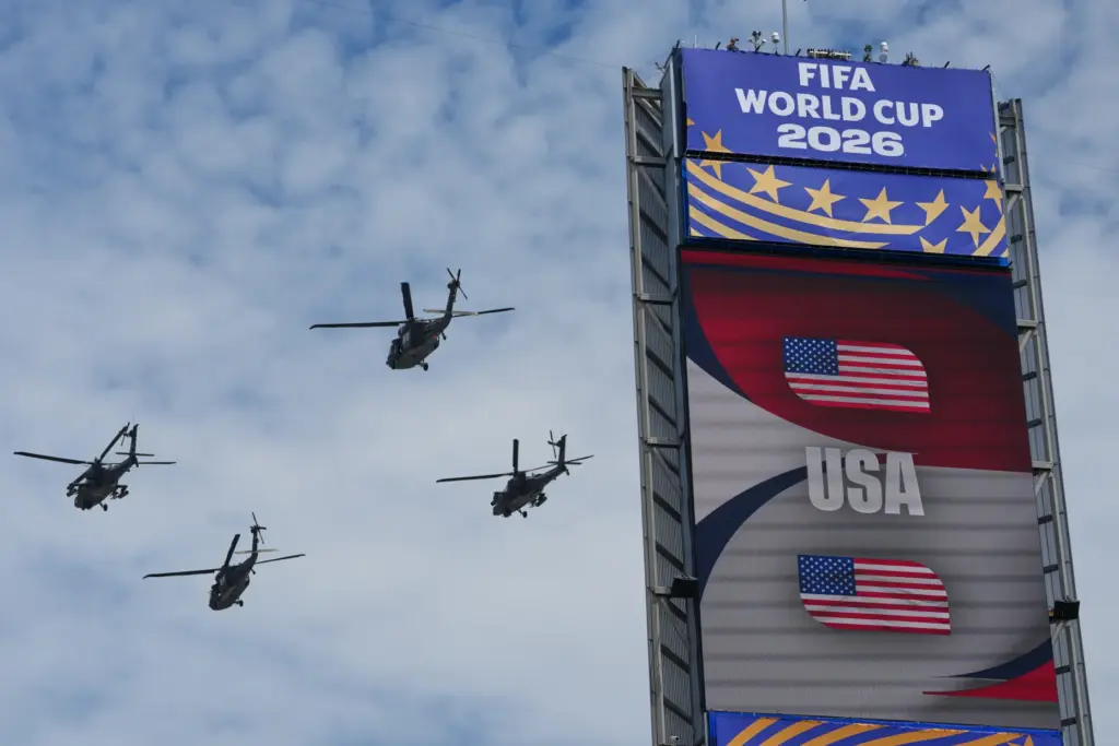 Helicopters fly over before the World Cup Group D soccer...