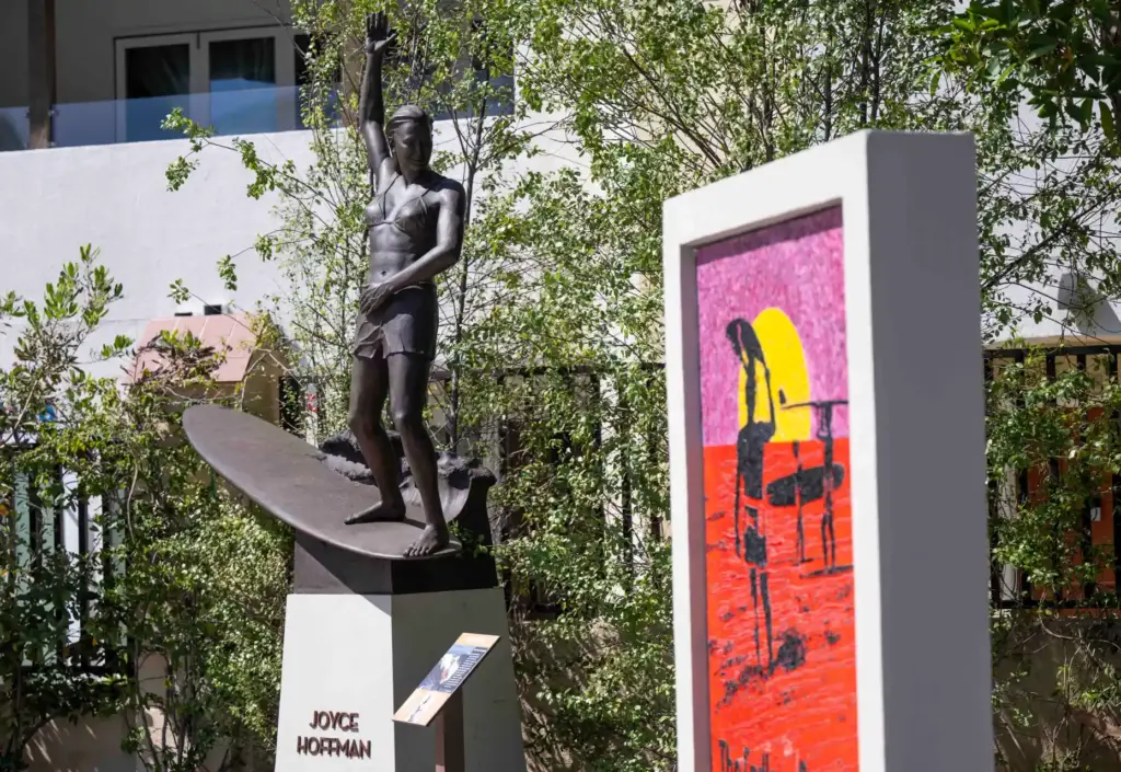 A life-sized bronze statue of famous surfer Joyce Hoffman, who...