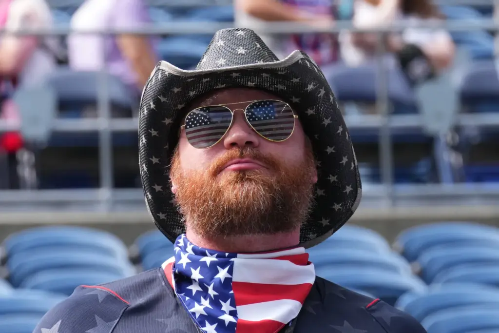 A US fan waits for the World Cup Group D...