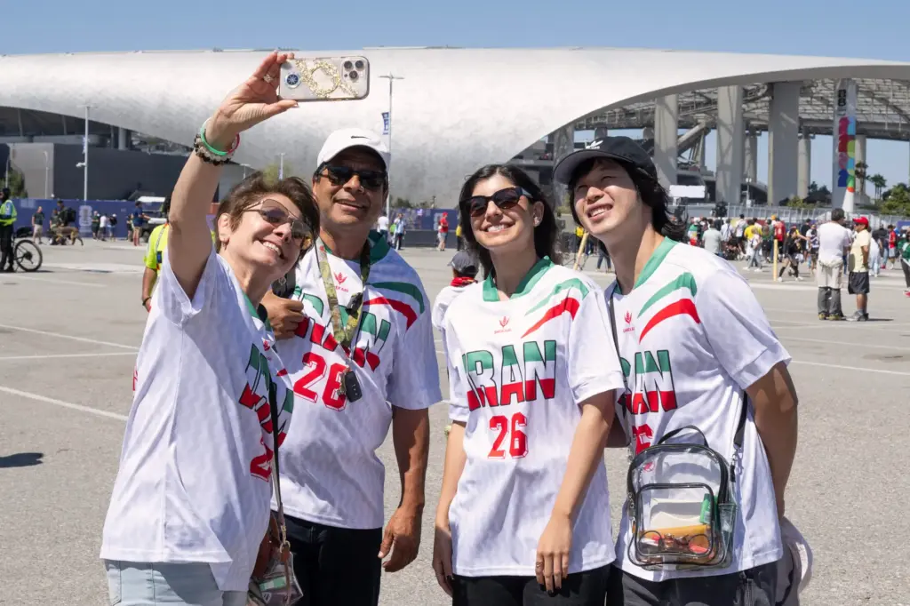 Iranian soccer fans take pictures outside SoFi Stadium before the...