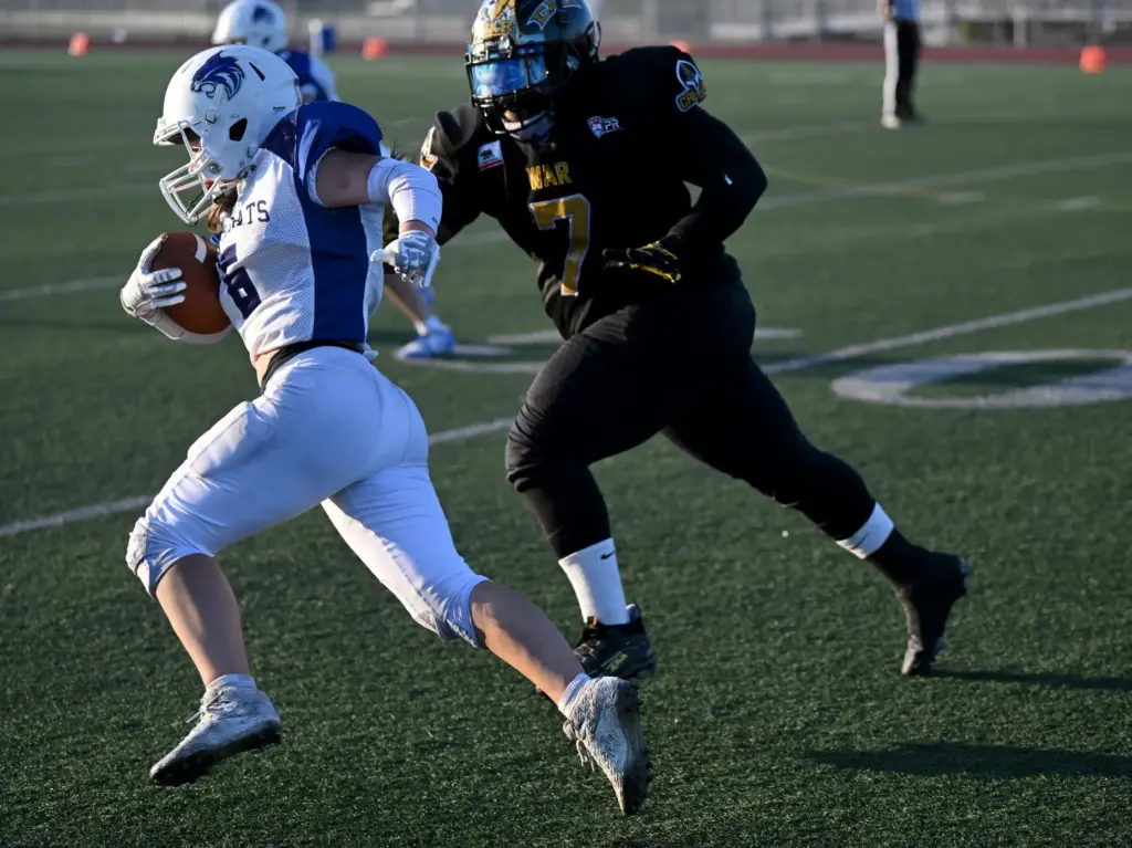 Cali War defensive back Sean Caldwell chases the Salt Lake...