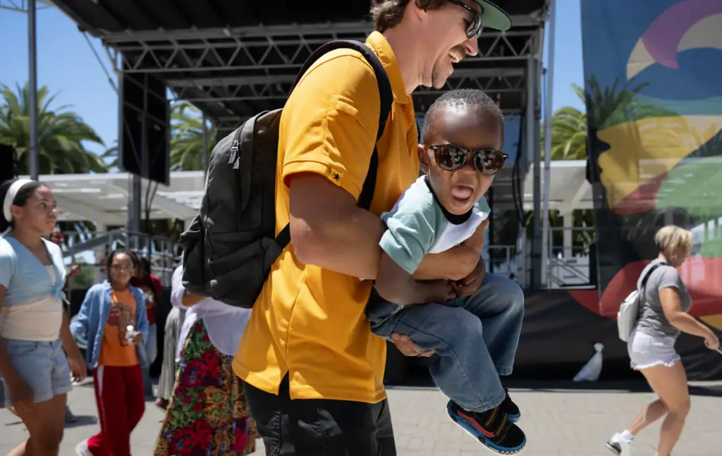 Mark Randel dances with his 2-year-old son, Jaxon, during the...