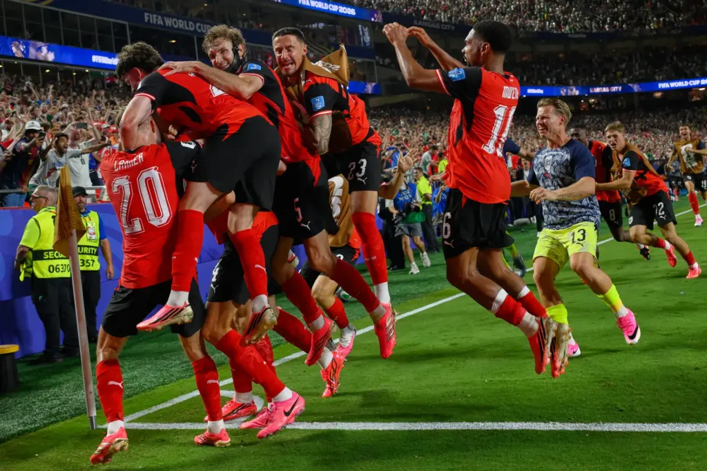 Austria’s players celebrates after Austria’s Sasa Kalajdzic (14) scored to...