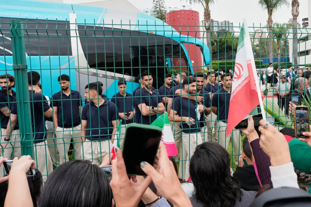 Fans greet members of the Iran World Cup soccer team...