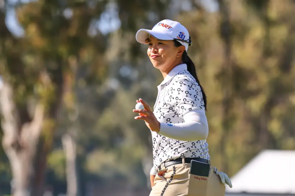 Sei Young Kim, of South Korea, reacts to her putt...