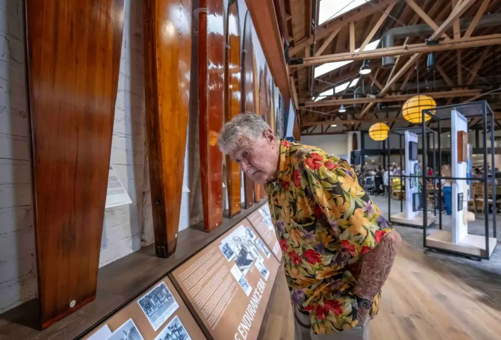 Joe Dunn of San Juan Capistrano reads the descriptions of...