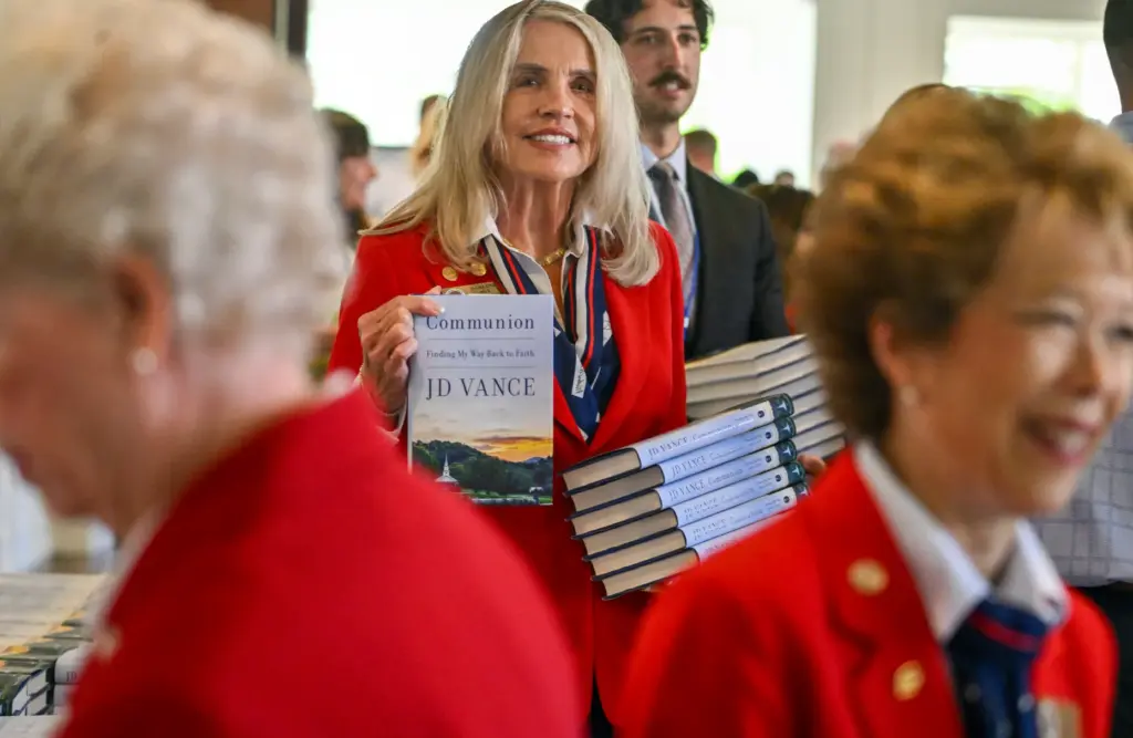 Darlene Sky hands out copies of Vice President JD Vanceâs...