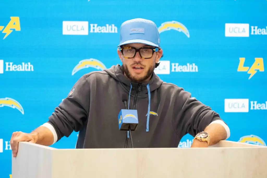 Chargers offensive coordinator Mike McDaniel speaks to the media during...