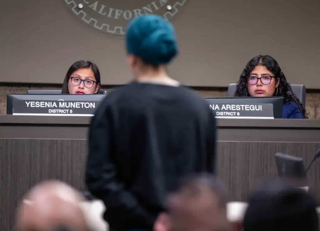 Garden Grove councilmembers Yesenia MuÃ±eton, left, and Ariana Arestegui listen...