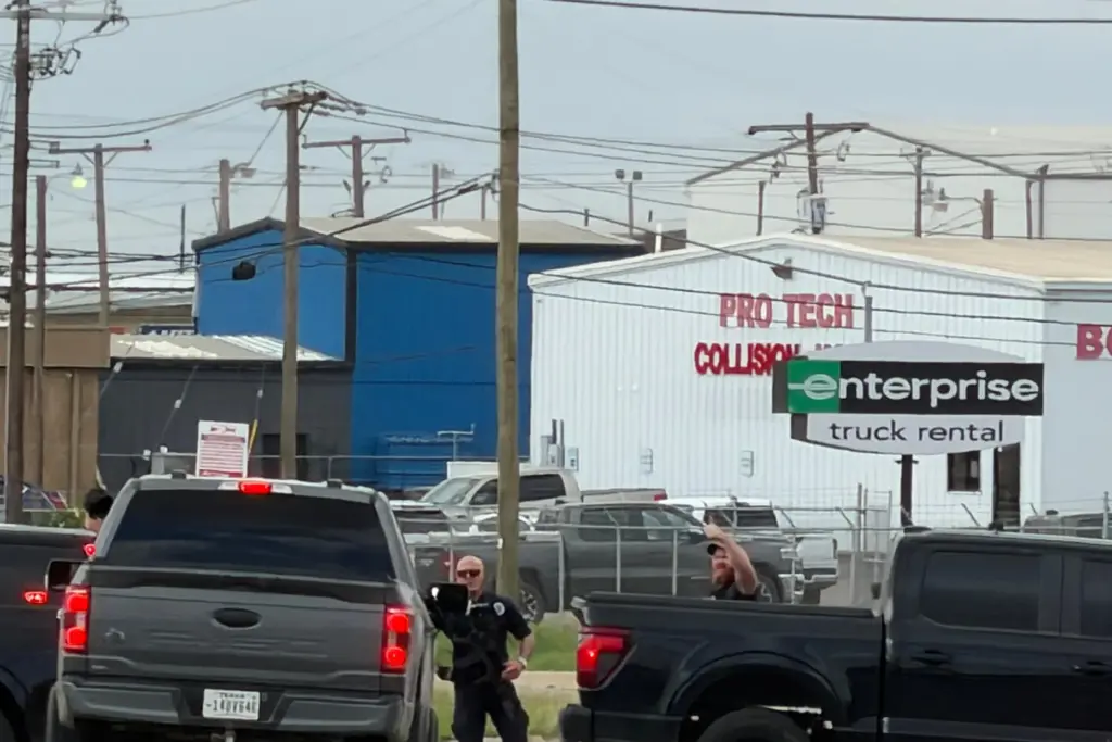 Law enforcement responds to an active shooting scene Friday, June...