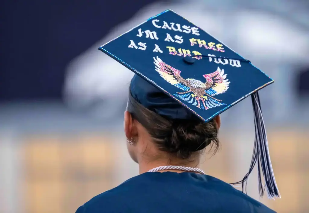 Piper Kawanaka sports a customized graduation cap that reads, âcause...