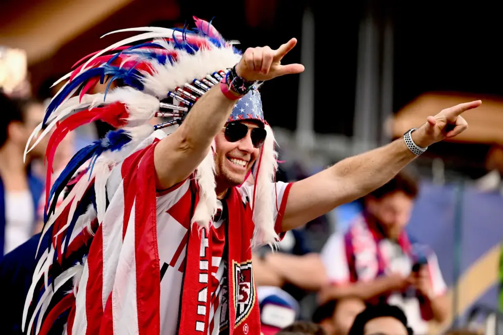 United States Fan wearing a Indian headdress prior to a...