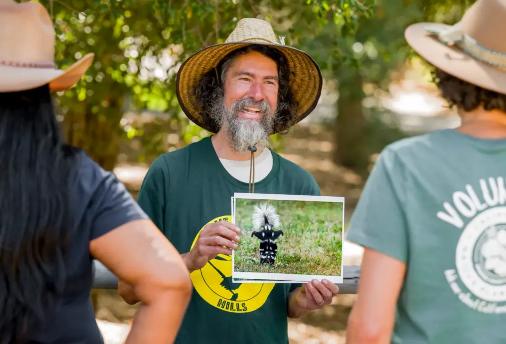 Joel Robinson, Naturalist For You and Save Orange Hills, center,...