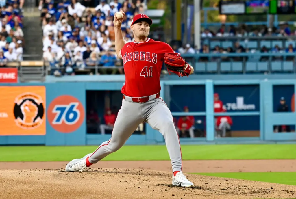 Starting pitcher Jack Kochanowicz #41 of the Angels throws to...